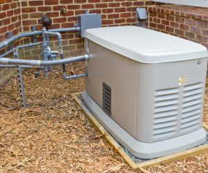 A home generator that provides electricity during a power outage.  It is connected to a propane gas supply.